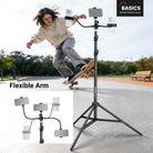 NEEWER ST015 Phone Tripod Stand with flexible arms for multi-angle recording, used outdoors to film a skateboarder.