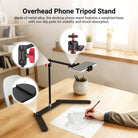 Overhead phone stand mounted above a desk, used to film drawing with adjustable arm, red locking knobs, and swivel ball head
